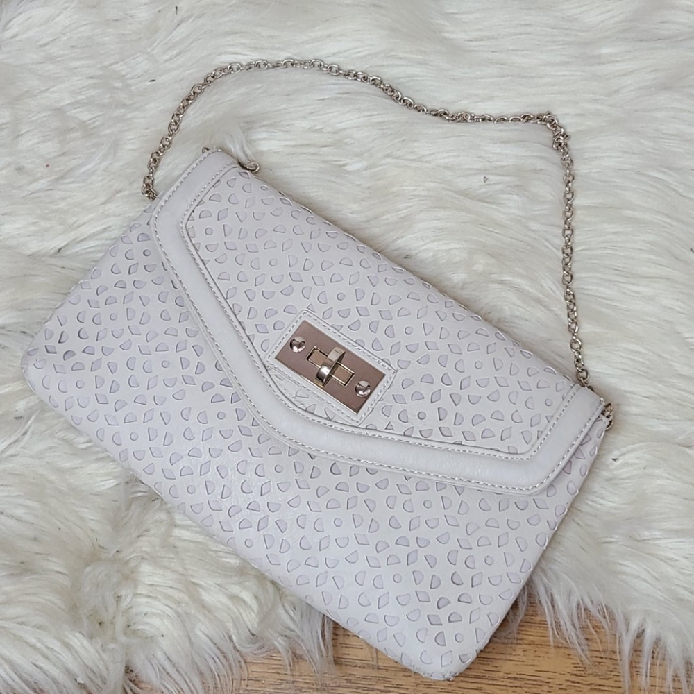 Aldo creamy white leather lazer cut handbag